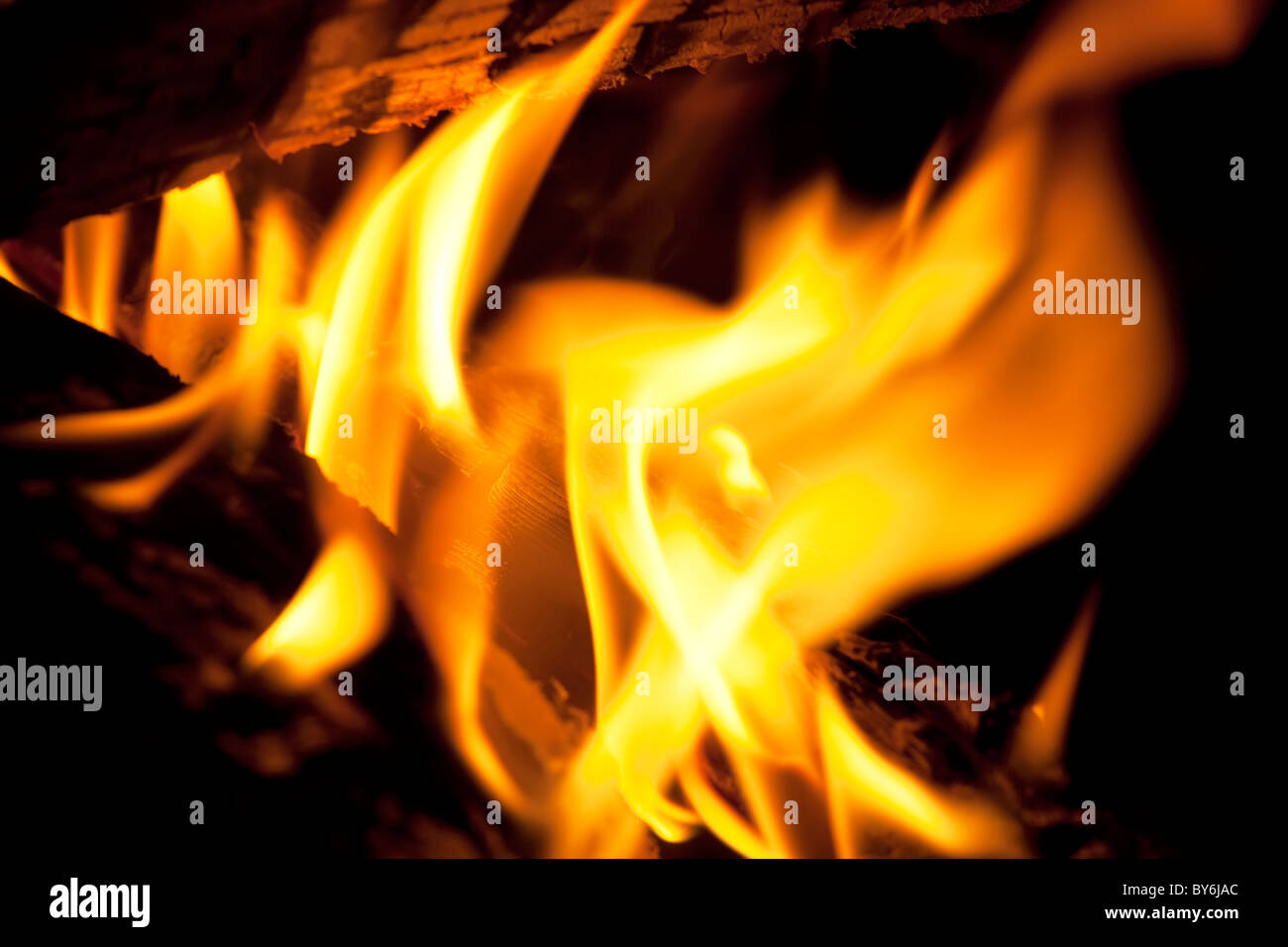 Logs burning in an outdoor campfire Stock Photo