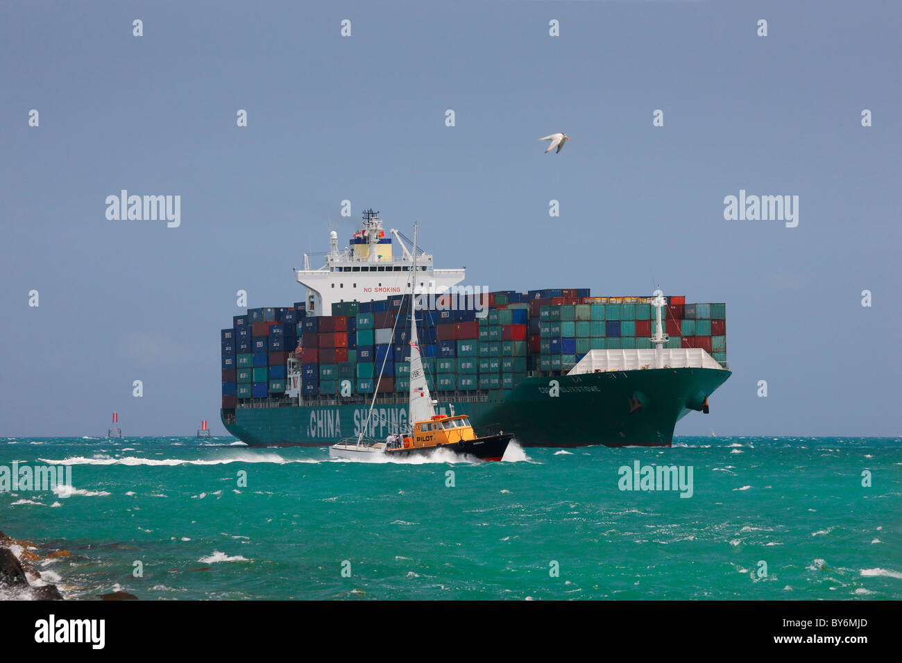 Cargo container ship approaches Port of Miami. Stock Photo