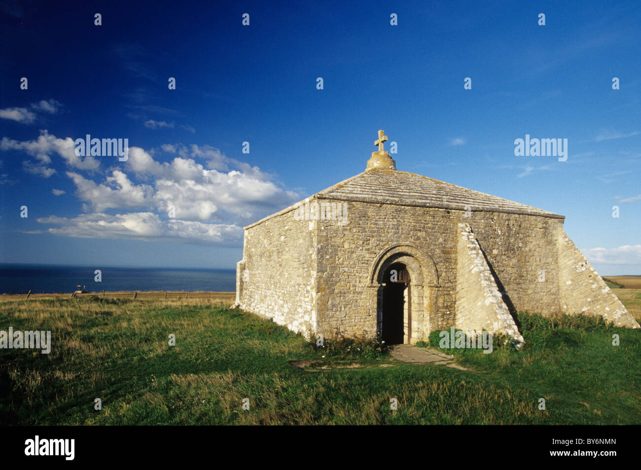 12th century St Aldhelm's Chapel on the Jurassic Dorset Coastal Path is an isolated Norman building, in the Purbeck Hills. Stock Photo