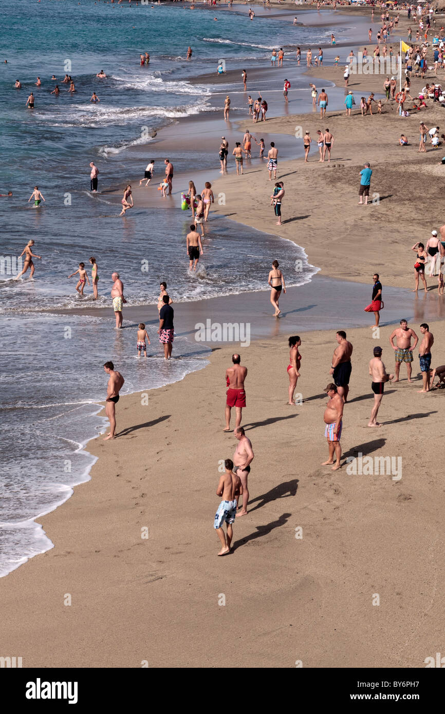 Holidaymakers on the beach at Costa Adeje in Tenerife, Canary Islands, Spain Stock Photo