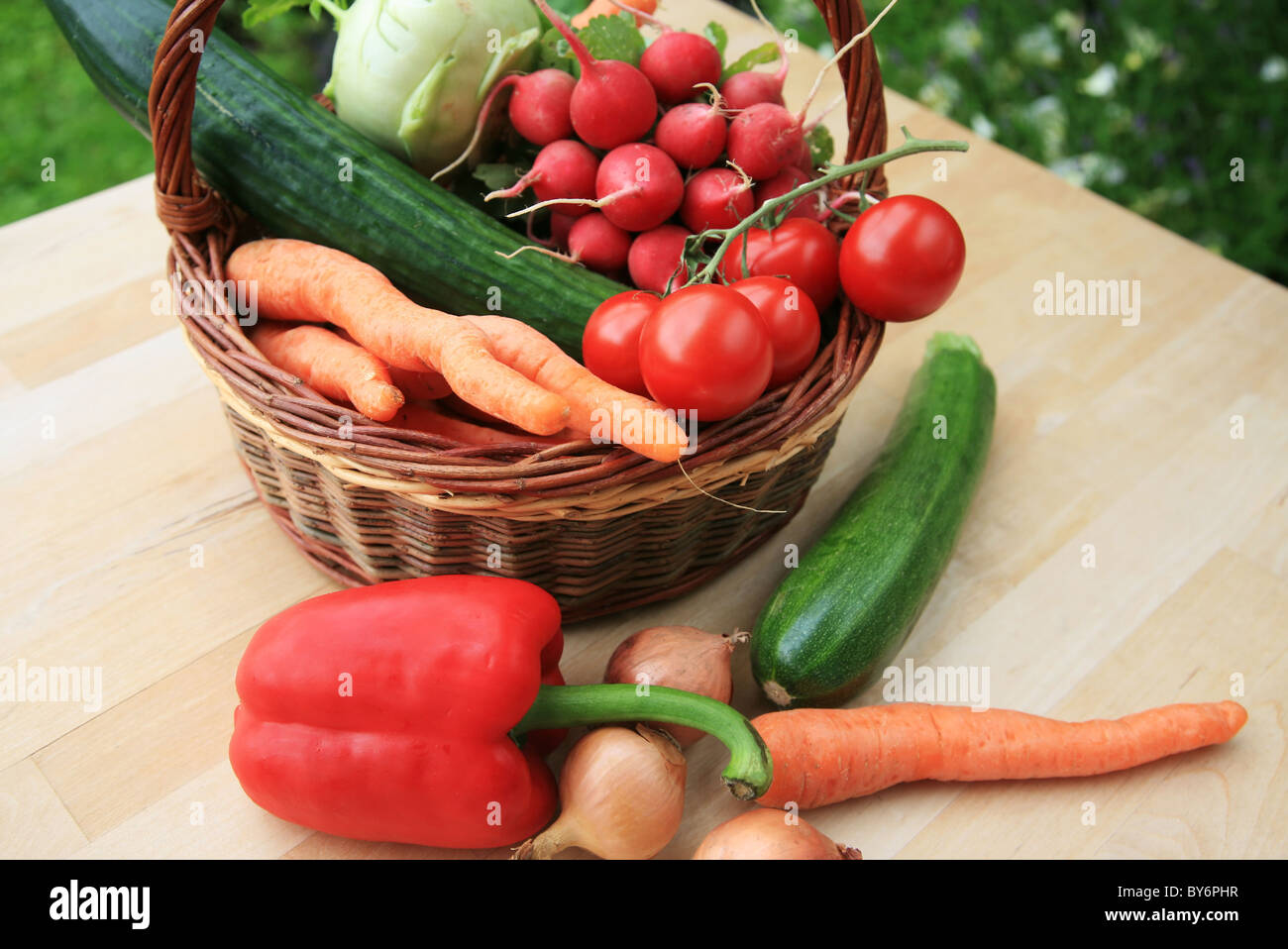Basket full of fresh vegetables Stock Photo - Alamy