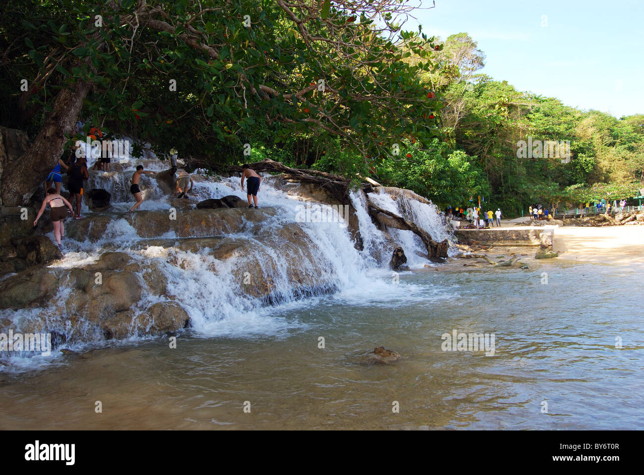 People standing in Dunns River Falls, Ocho Rios, Middlesex County, Jamaica, Caribbean. Stock Photo