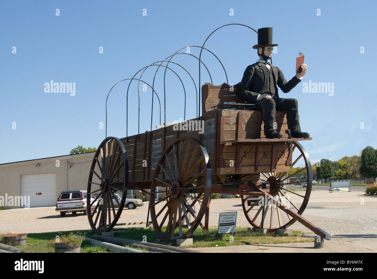Railsplitter Covered Wagon driven by Abe Lincoln reading a law book ...