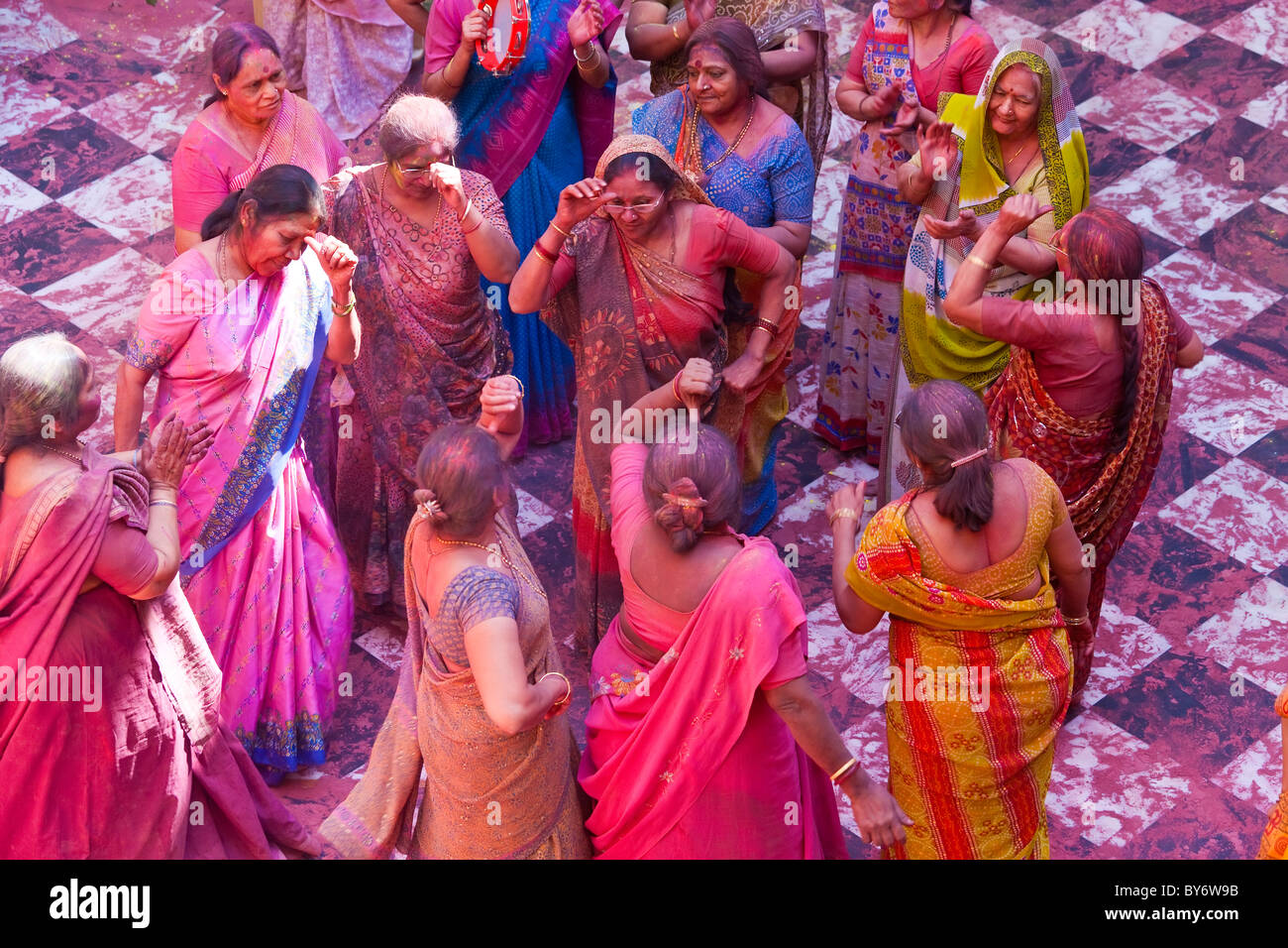 Dancing during Holi Festival, Mathura, Uttar Pradesh, India Stock Photo