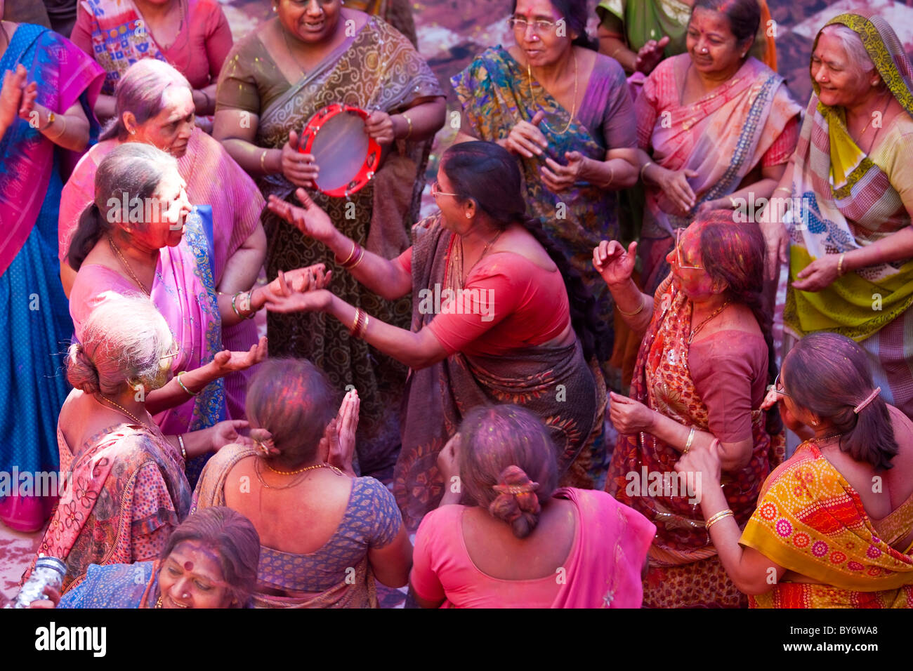 Dancing during Holi Festival, Mathura, Uttar Pradesh, India Stock Photo