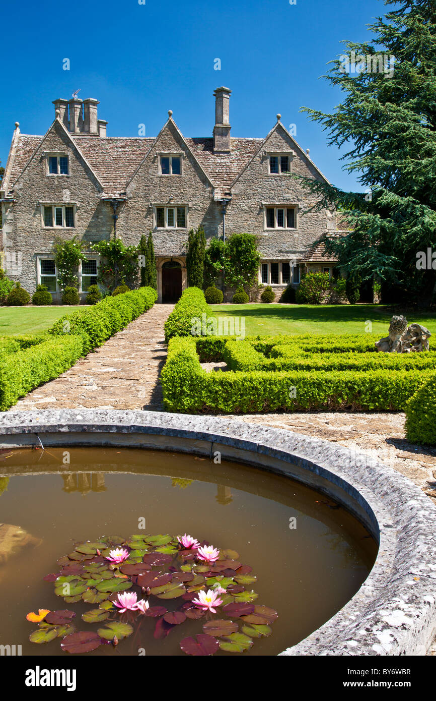 A grand English country manor house in summer Stock Photo