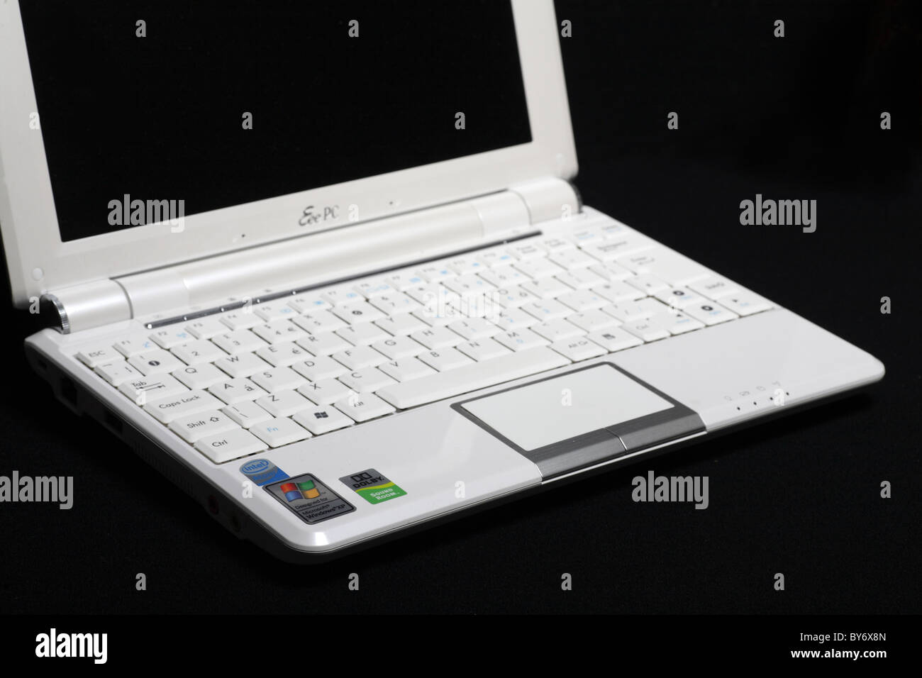 White Asus Eeepc 10 inch screen windows netbook mini laptop computer PC  isolated on black Stock Photo - Alamy