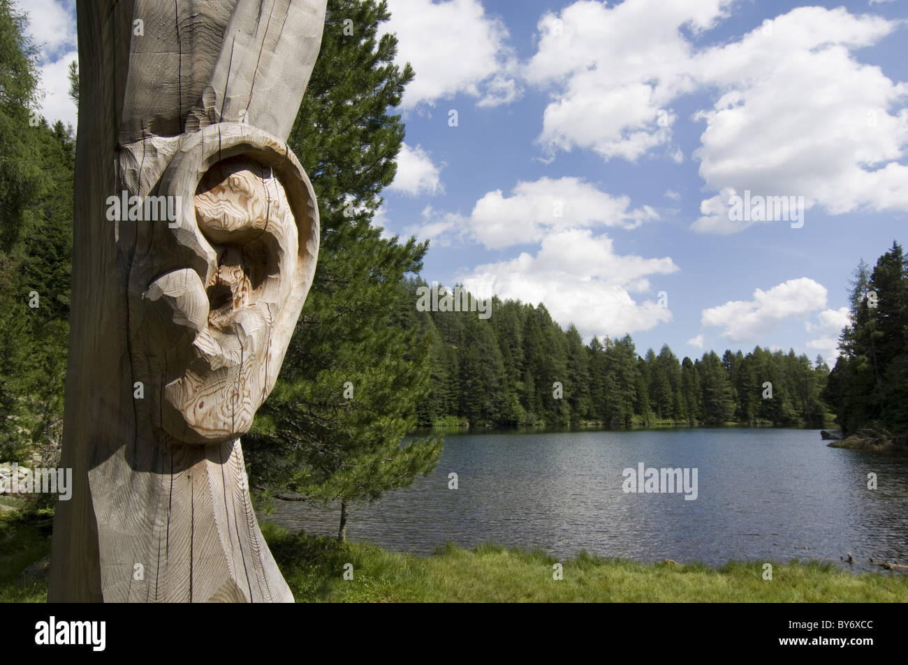 Sculpture of an ear at a lake shore, sensory perception, silentness, Turracher Hoehe, Austria Stock Photo