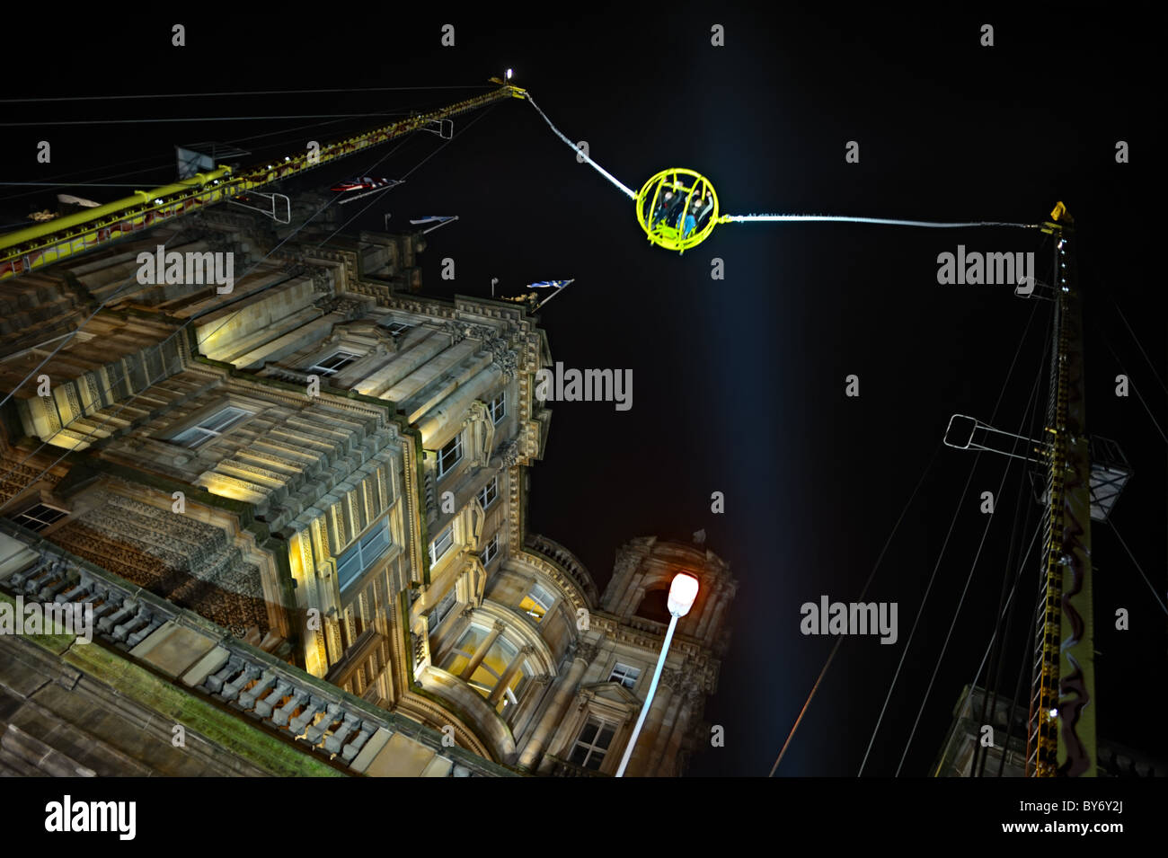 Reverse bungee ride outside the former Bank of Scotland headquarters, Edinburgh, Scotland, UK, Europe Stock Photo