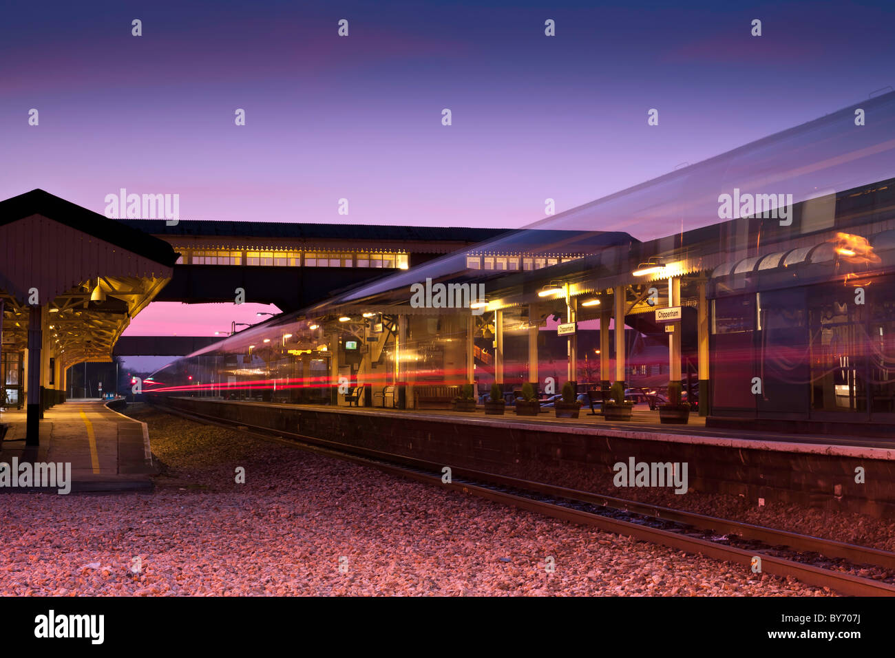 Twilight at the station - Evening train Stock Photo