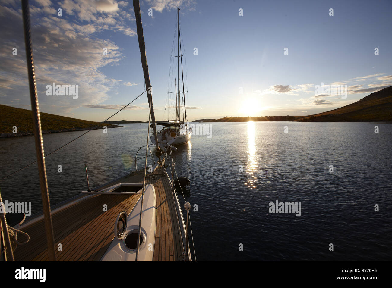 Sailing boat in a bay at sunset, Kornati archipelago, Croatia, Europe Stock Photo