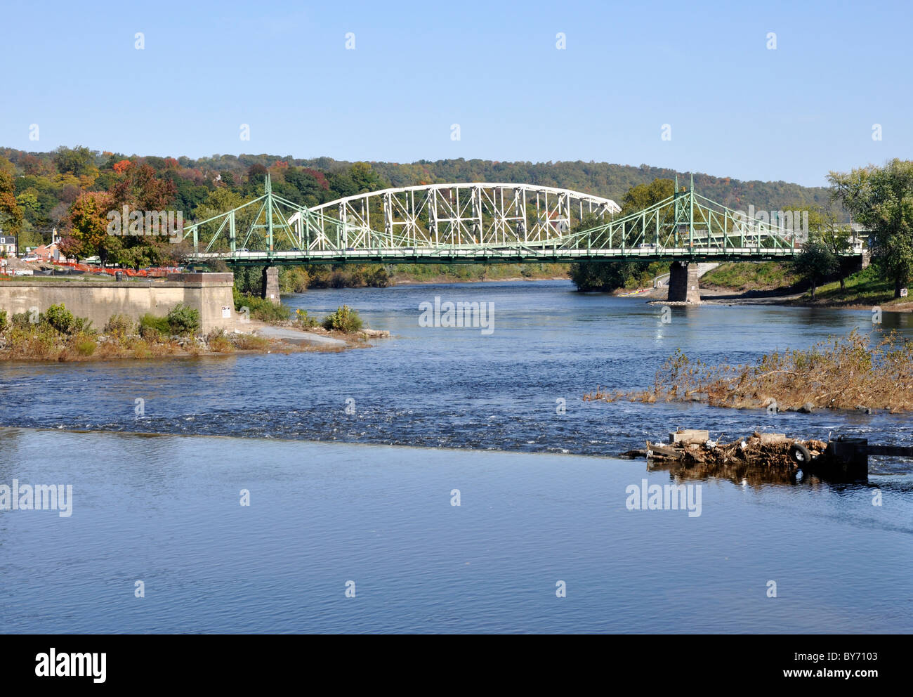 Two steel bridges that connect the cities of Easton, Pennsylvania and Phillipsburg, New Jersey.  The bridges span over the Delaw Stock Photo