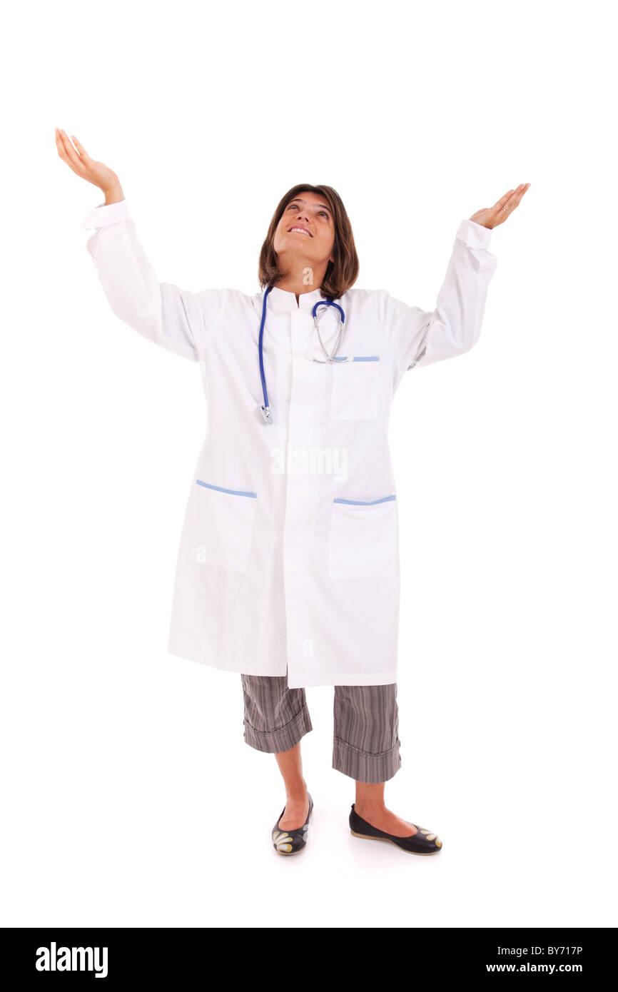 friendly woman doctor with her arms outstretched and looking up (isolated on white) Stock Photo
