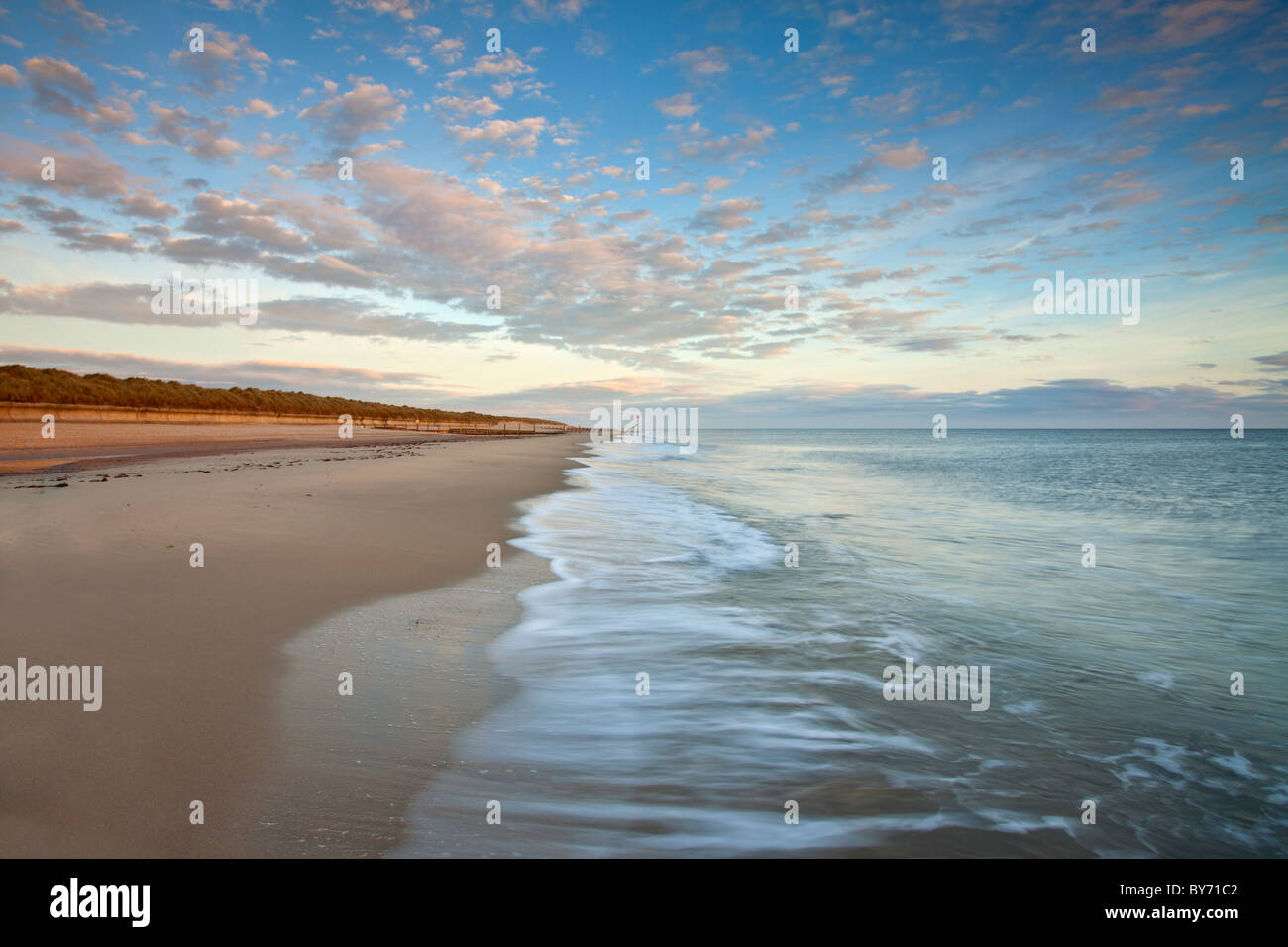 Horsey beach captured at first light on the Norfolk Coast Stock Photo
