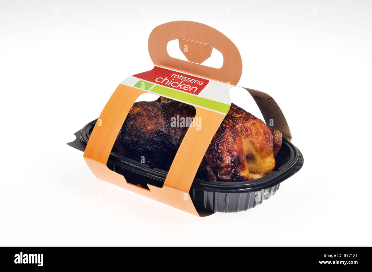 Cooked hot rotisserie chicken in packaging on white background, cutout. Stock Photo