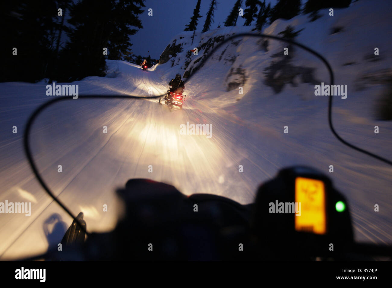 Snowmobiles on runway to mountain lodge Crystal Hut, Blackcomb Mountain, Whistler, British Columbia, Canada Stock Photo