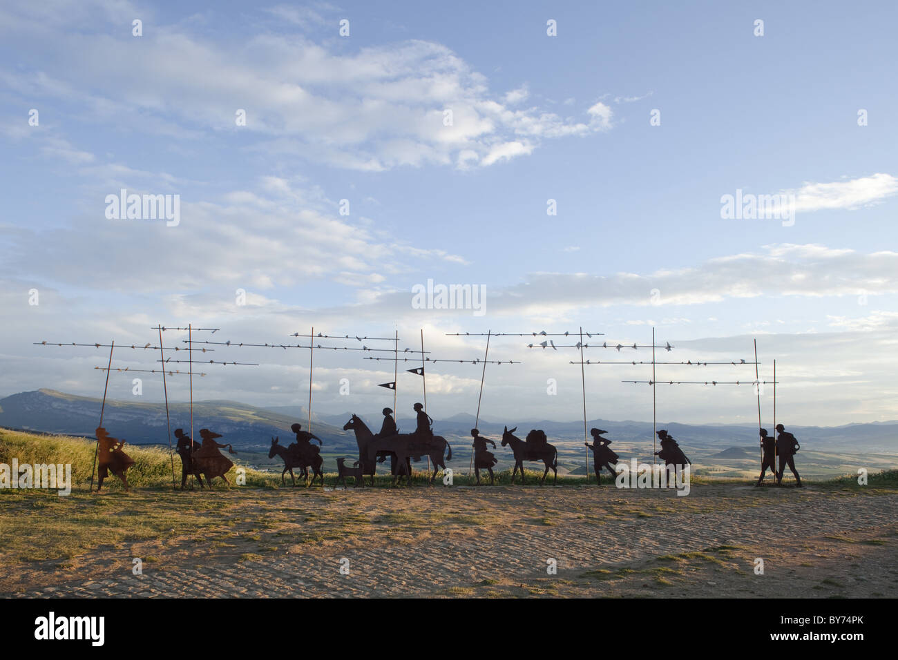 Iron sculpture of a group of pilgrims, Alto del Perdon, Sierra del Perdon, near Pamplona, Camino Frances, Way of St. James, Cami Stock Photo