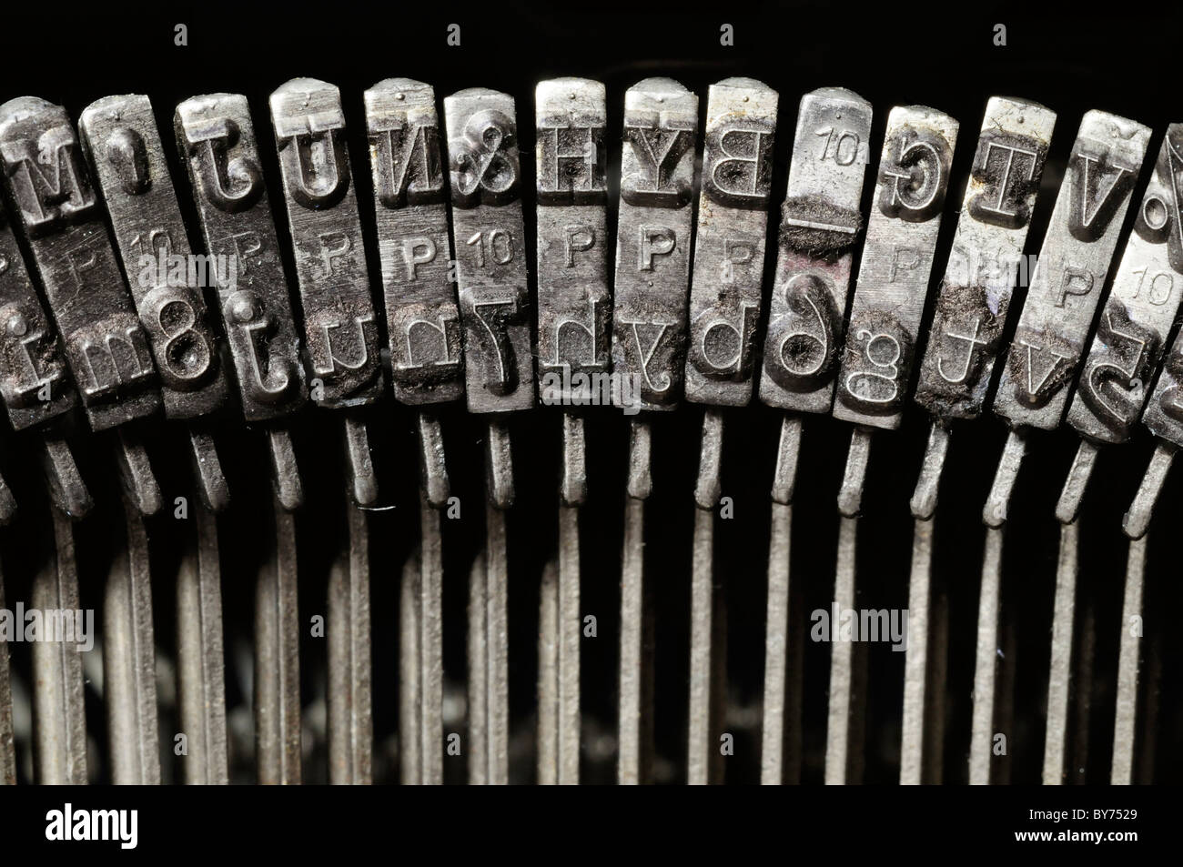 Close-up of old typewriter letter and symbol keys Stock Photo