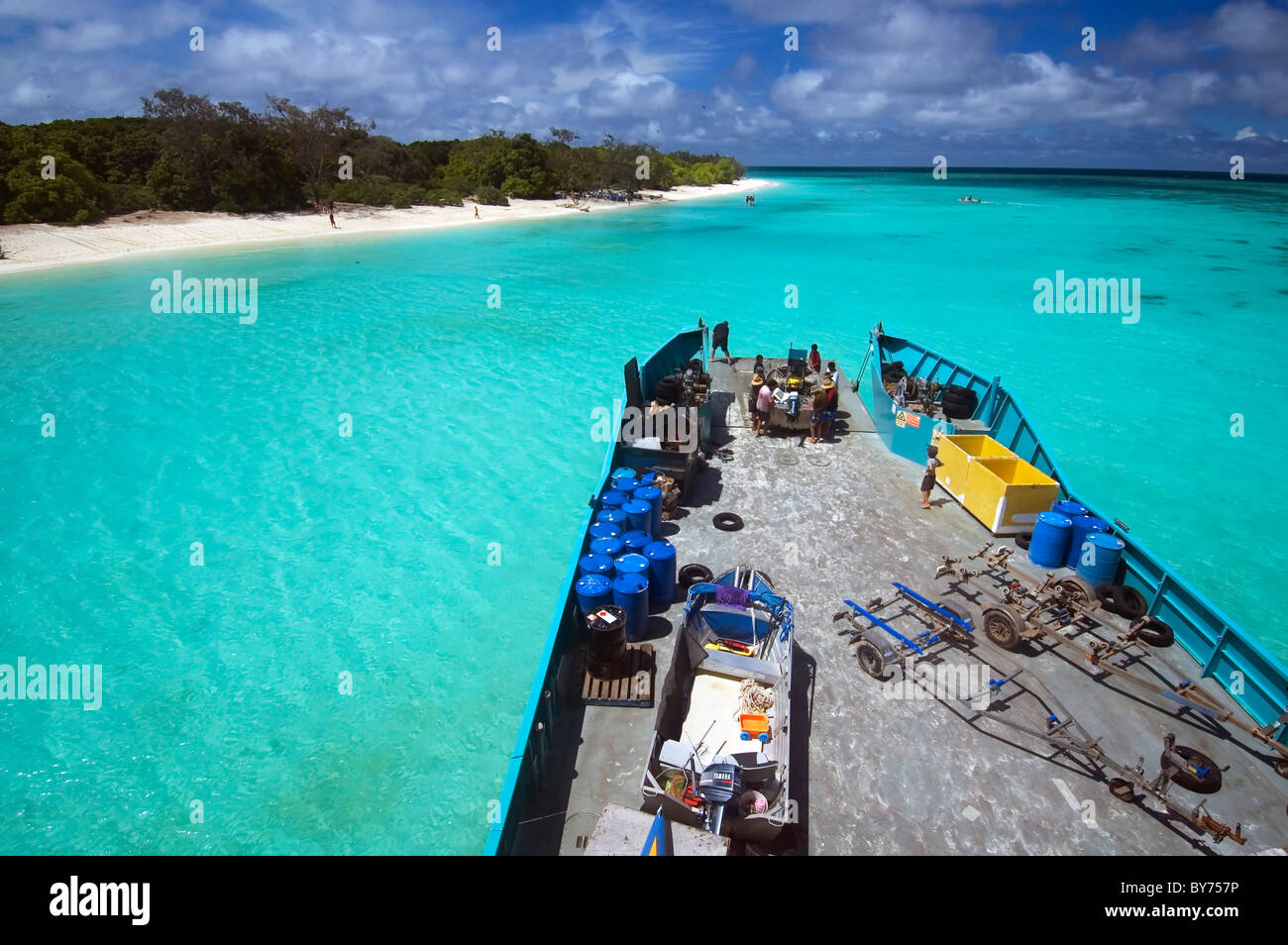 Loading boats onto barge at North West Island, Capricorn Bunker Group, southern Great Barrier Reef, Queensland, Australia Stock Photo