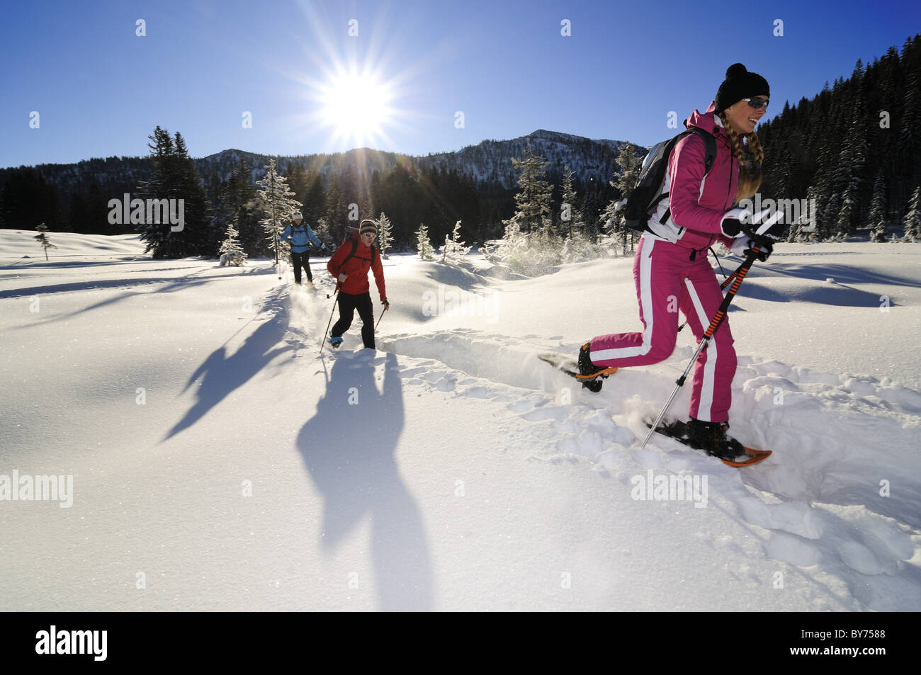 People snowshoeing in snowy landscape, Hemmersuppenalm, Reit im Winkl