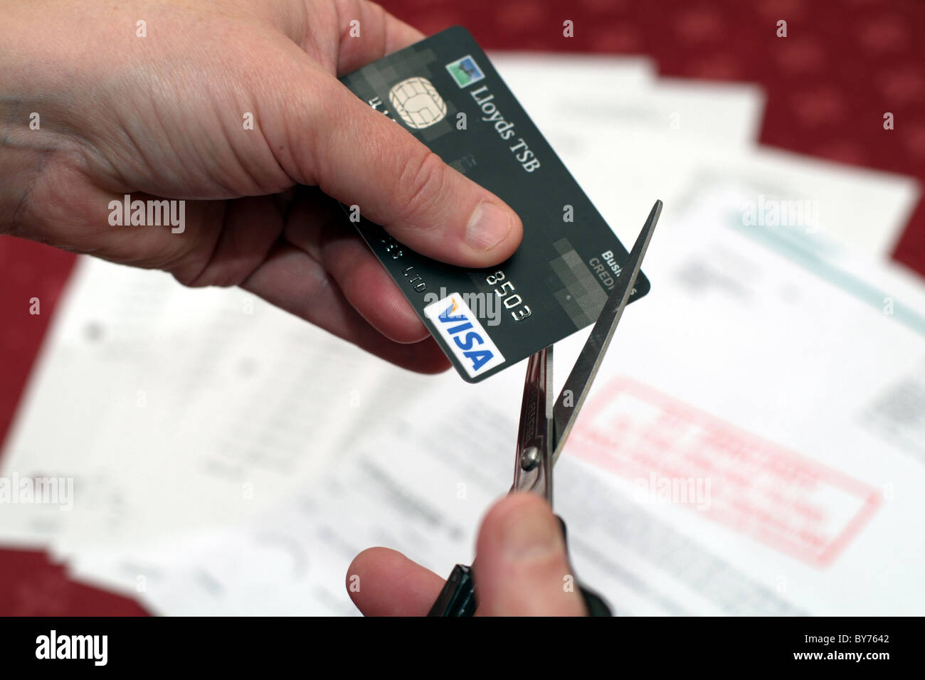 Cutting up credit cards hires stock photography and images Alamy