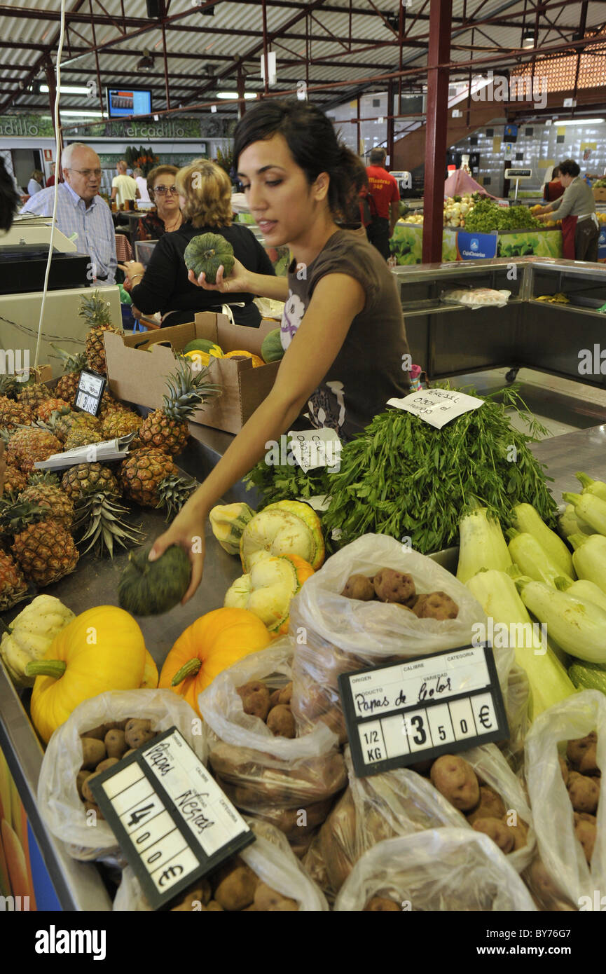 Saleswoman at a country market at Tacoronte, Mercado, Tenerife, Canary Islands, Spain Stock Photo