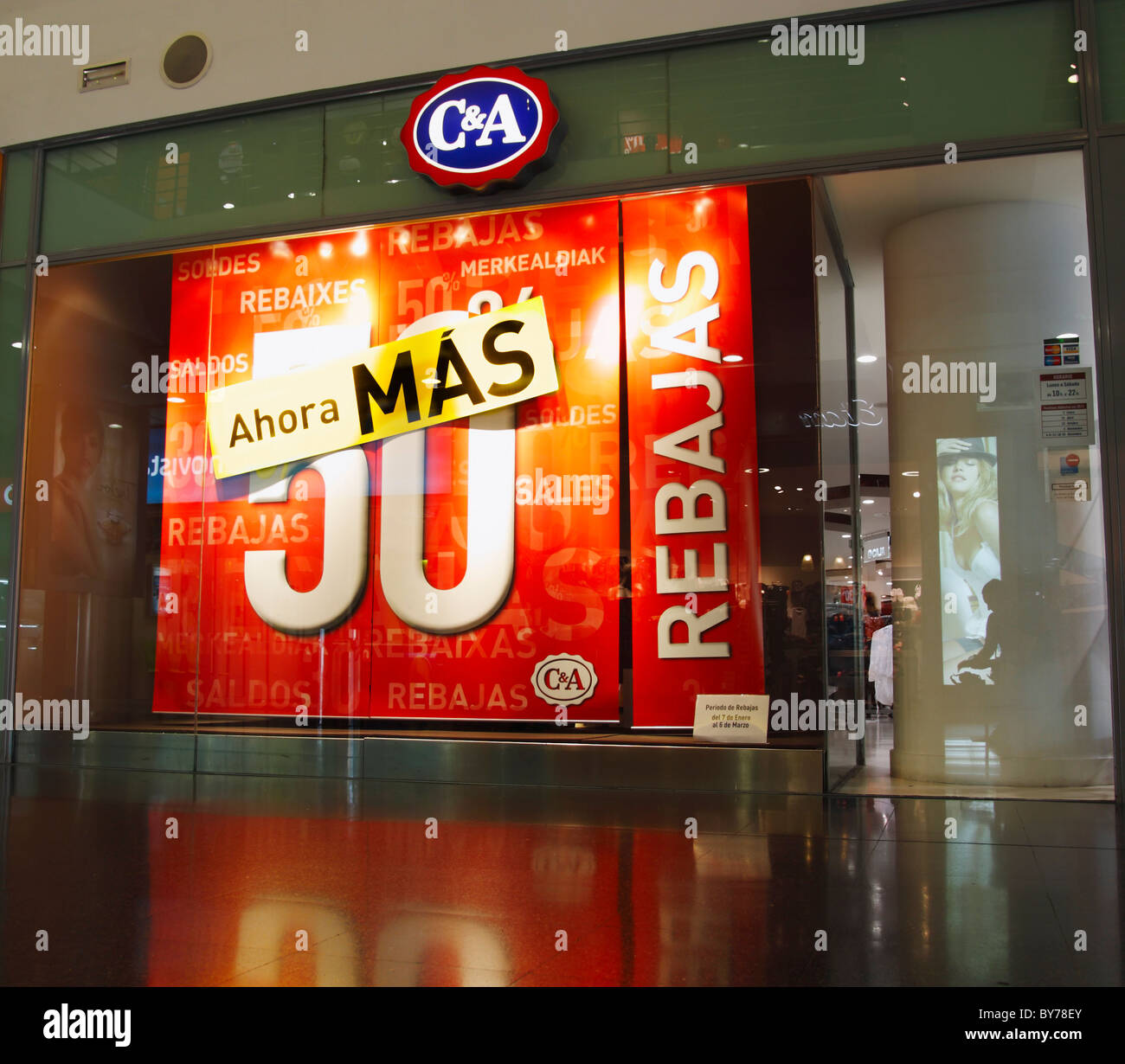 Sale sign in Spanish (Rebajas) in C&A store window in Spain Stock Photo -  Alamy