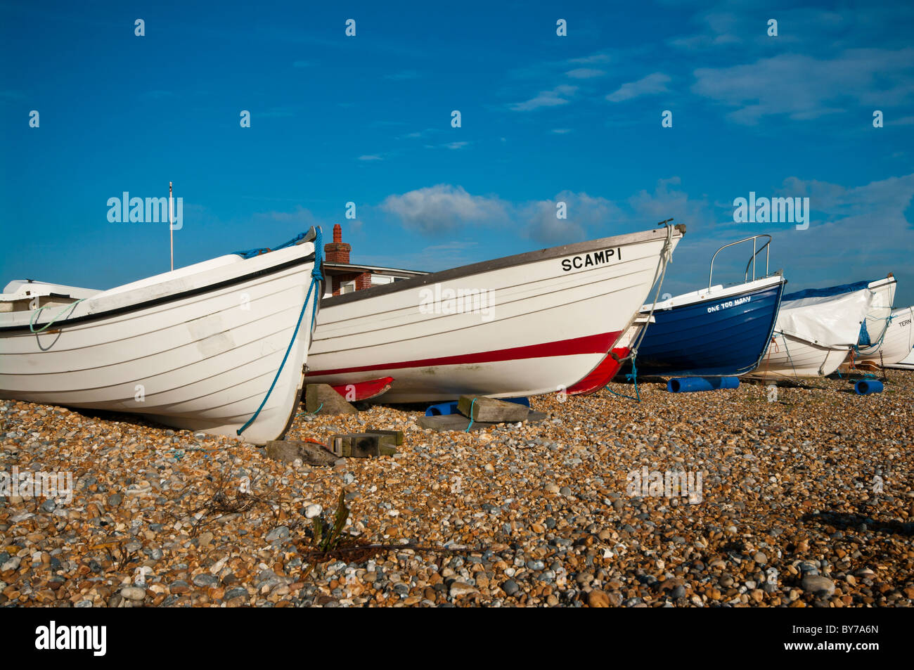 Wooden fishing boats on beach hi-res stock photography and images - Alamy