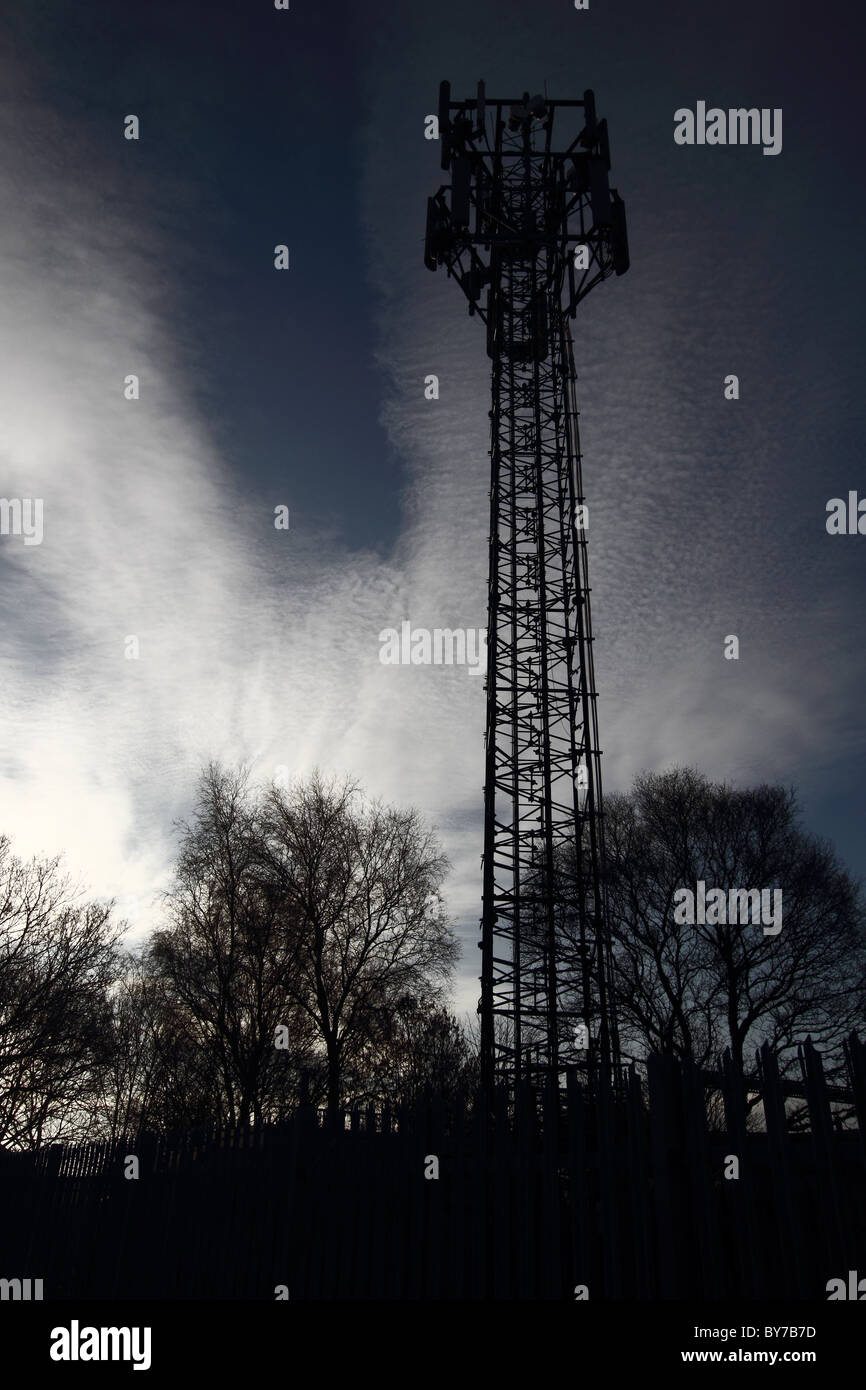 Mobile phone mast or base station,the increasing co-location of multiple  mobile operators, and therefore multiple base stations Stock Photo - Alamy