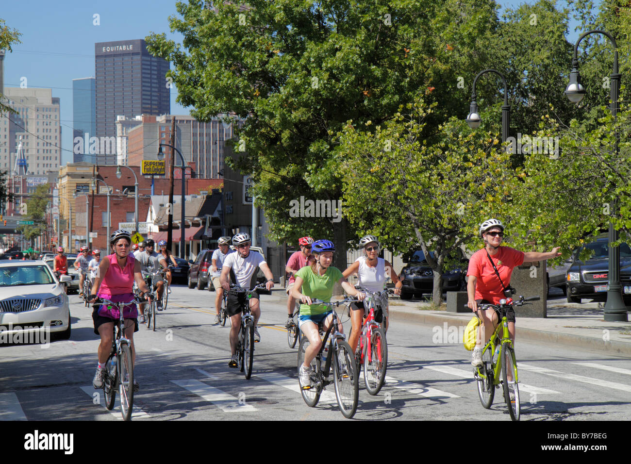 Atlanta Georgia,Auburn Avenue,bicycle,bicycling,riding,biking,rider,group ride,cyclist,exercise,fitness,recreation,helmet,safety,man men male,woman fe Stock Photo