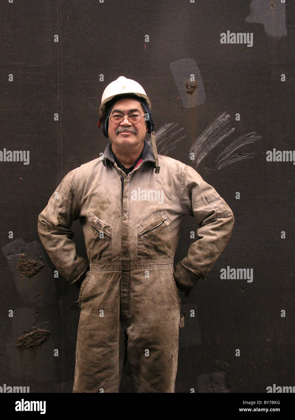 Tug boat repair man Stock Photo Alamy