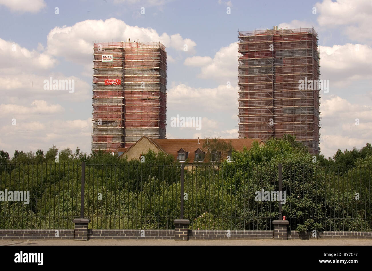 Two apartment blocks covered in scaffolding Stock Photo