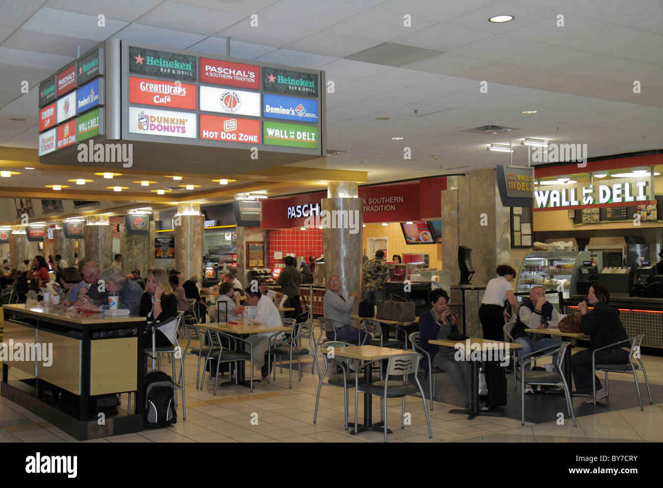 Atlanta Georgia,ATL,Hartsfield Jackson Atlanta International Airport,fast food,food court plaza,restaurant chain,sign,table,eating,man men male,woman Stock Photo