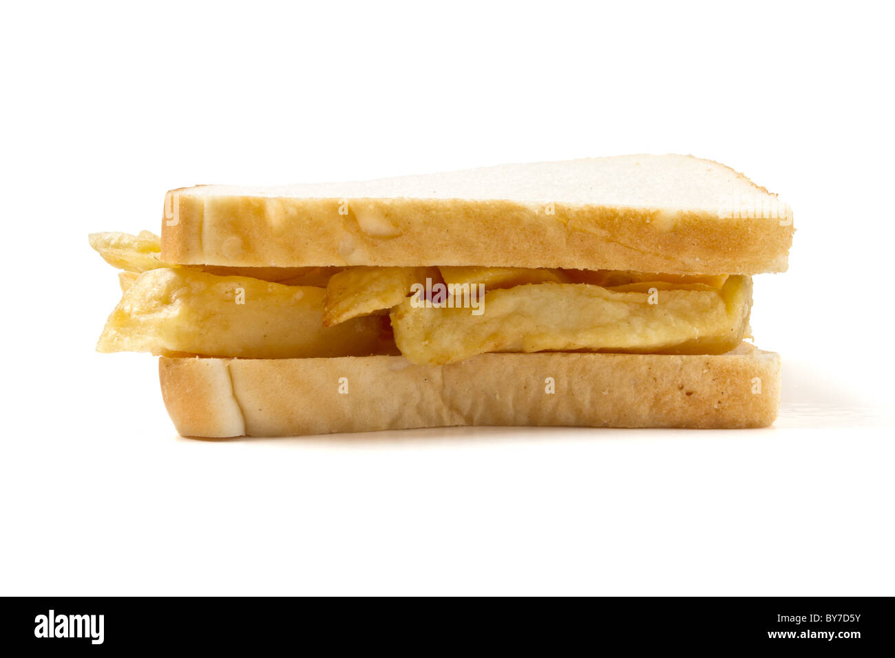 Traditional English chip sandwich isolated on white. Stock Photo