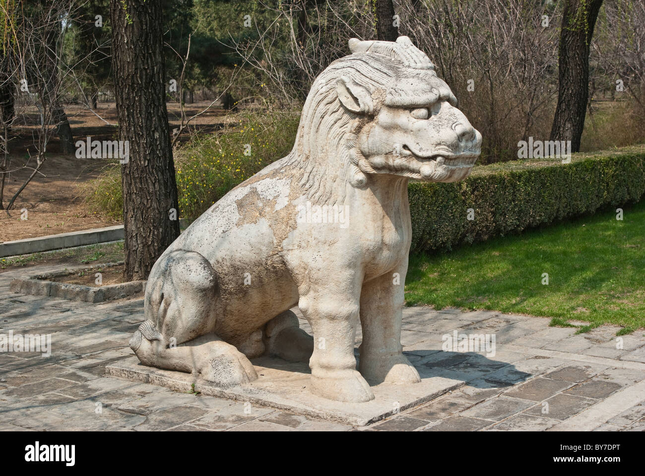 Asia, China, Beijing, Changping. Oversize sculpture of a mythical qilin; one of 36 figures on the Sacred Way at Ming Tombs. Stock Photo