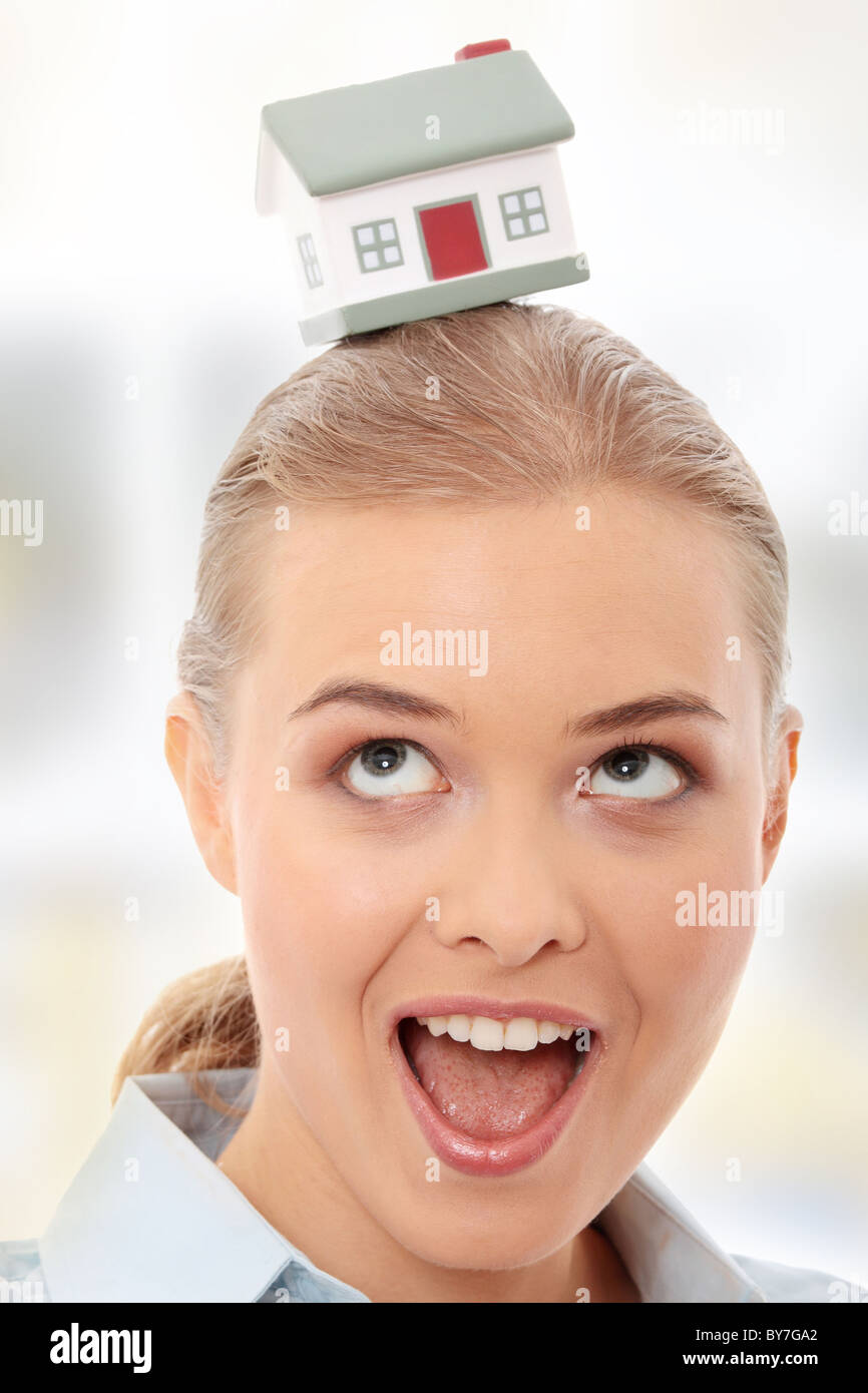 Young beautiful business woman with house model - real estate Stock ...