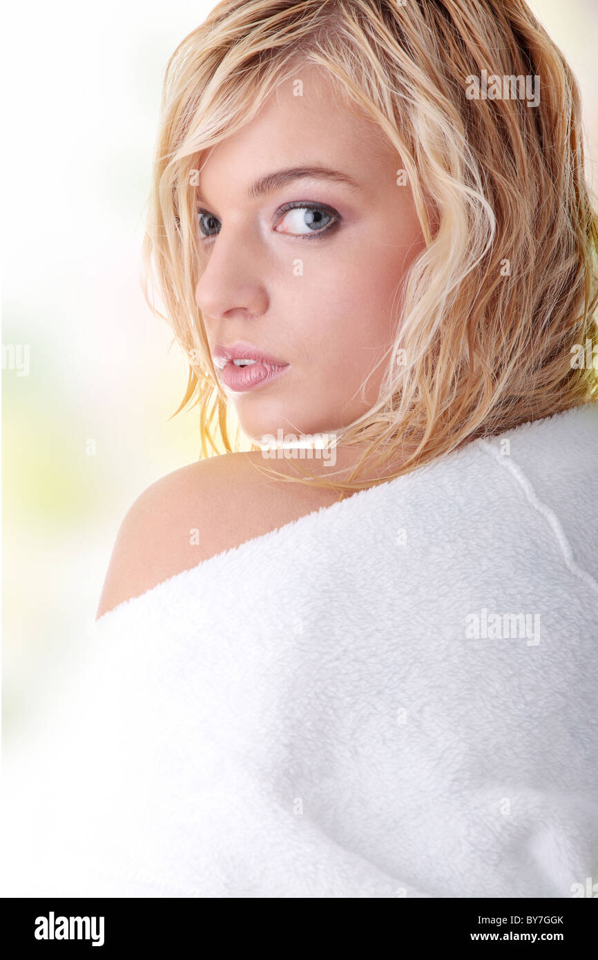 Young Beautiful Blond Teen Woman Dressed In White Bathrobe Stock Photo