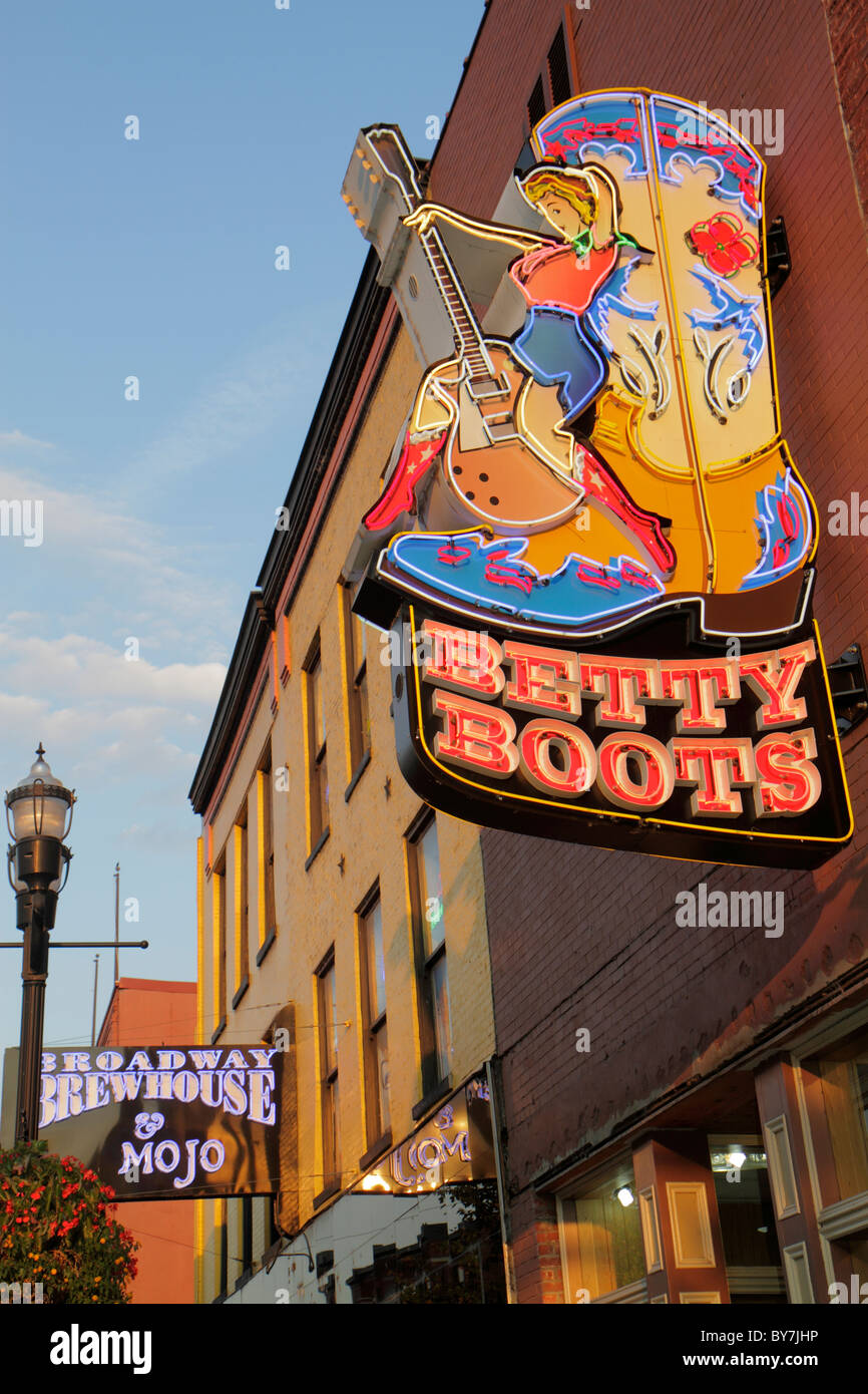Tennessee Nashville,Music City USA,downtown,Lower Broadway,neon light,sign,Betty Boots,western store,cowboy boot,shopping shopper shoppers shop shops Stock Photo