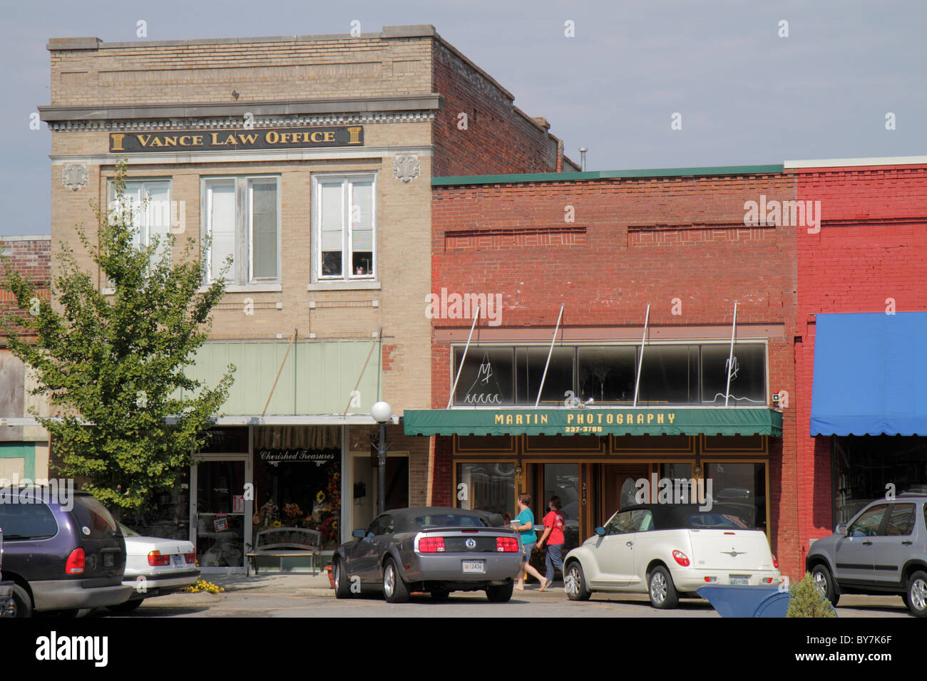 Tennessee Watertown,small town,historic district,building,law office,photography studio,outside exterior,front,entrance,facade,brick,parked car,Americ Stock Photo