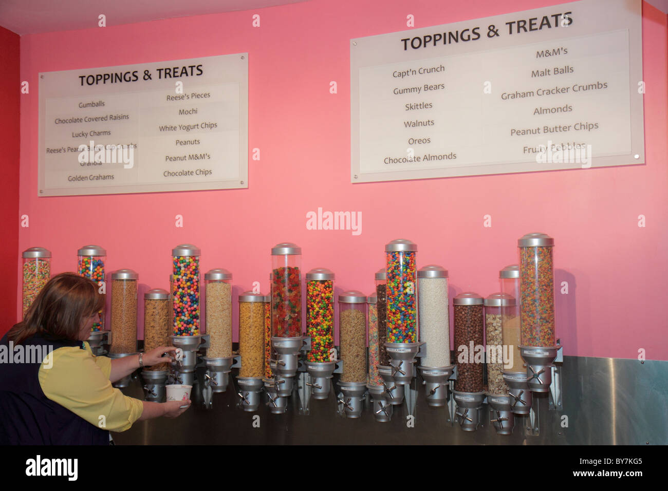 Tennessee Chattanooga,Northside Community,Frazier Avenue,Sweet CeCe's Frozen yogurt,yoghurt,toppings,treats,self serve,woman female women,dessert,bulk Stock Photo