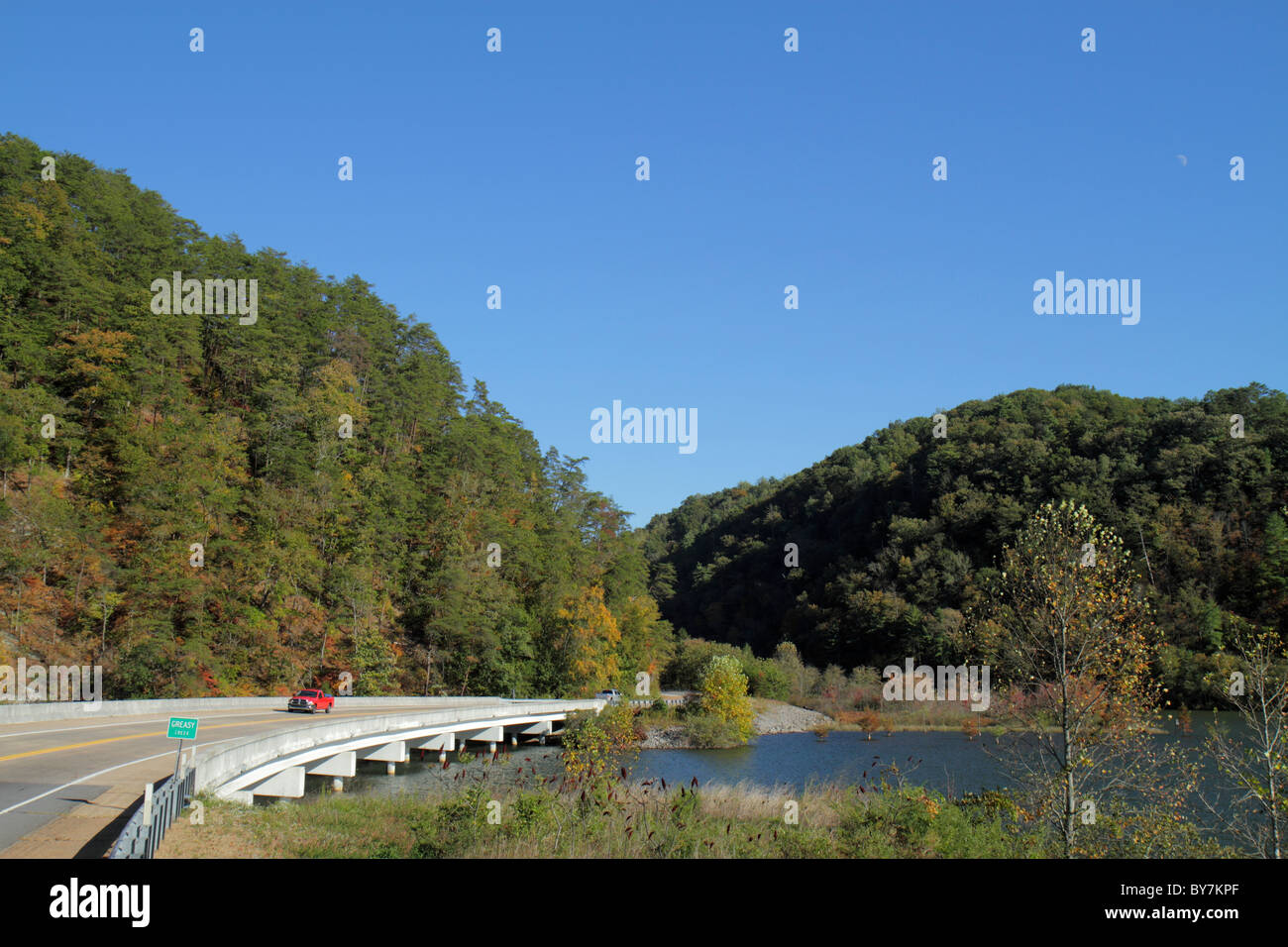 Tennessee,TN,South,Cherokee National Forest,Greasy Creek water,Department of Agriculture,federal land,trees,managed resource,bridge,roadway,blue sky,r Stock Photo