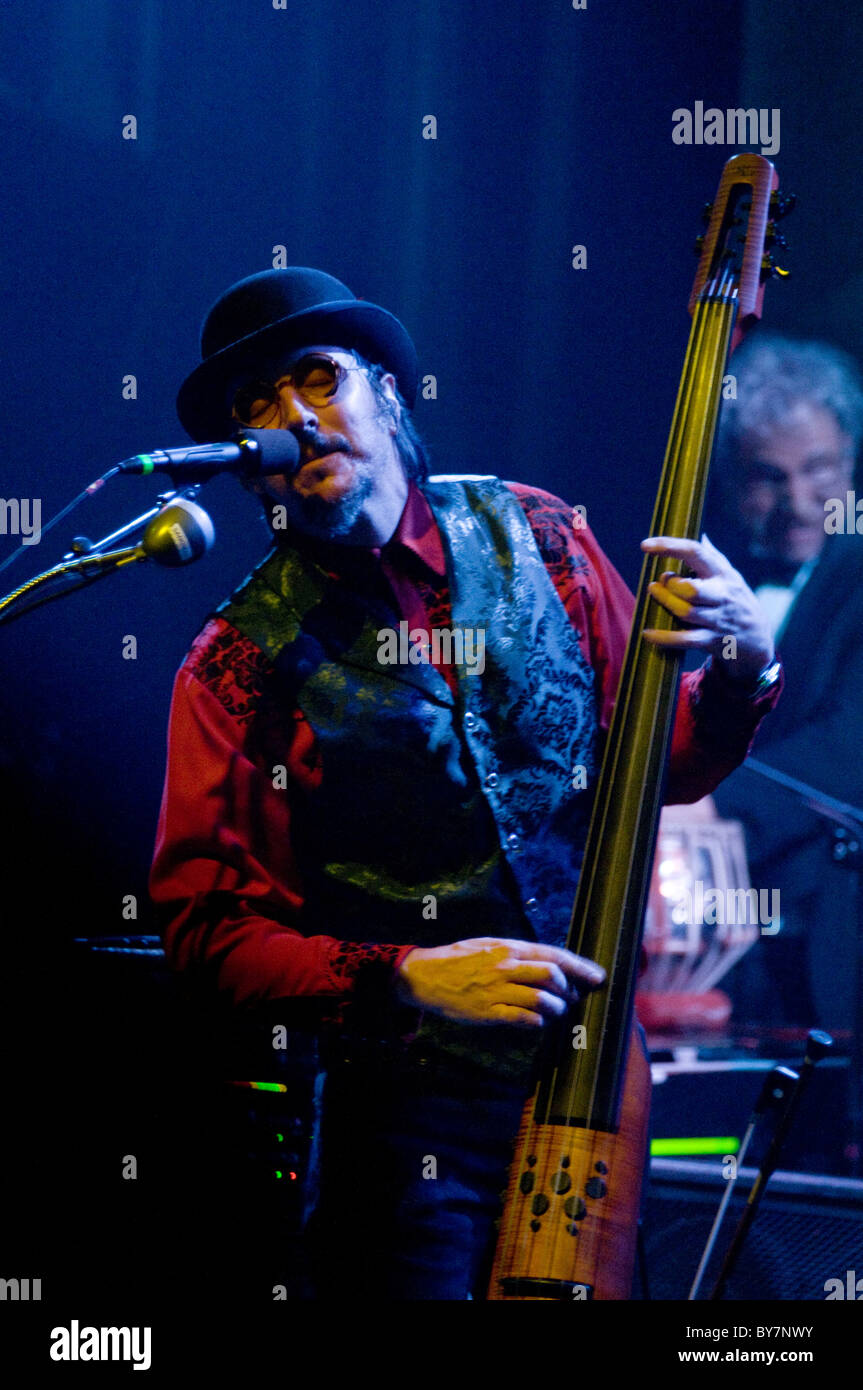 Les Claypool plays the upright bass while singing at the Fox Theatre in Boulder Colorado. Stock Photo