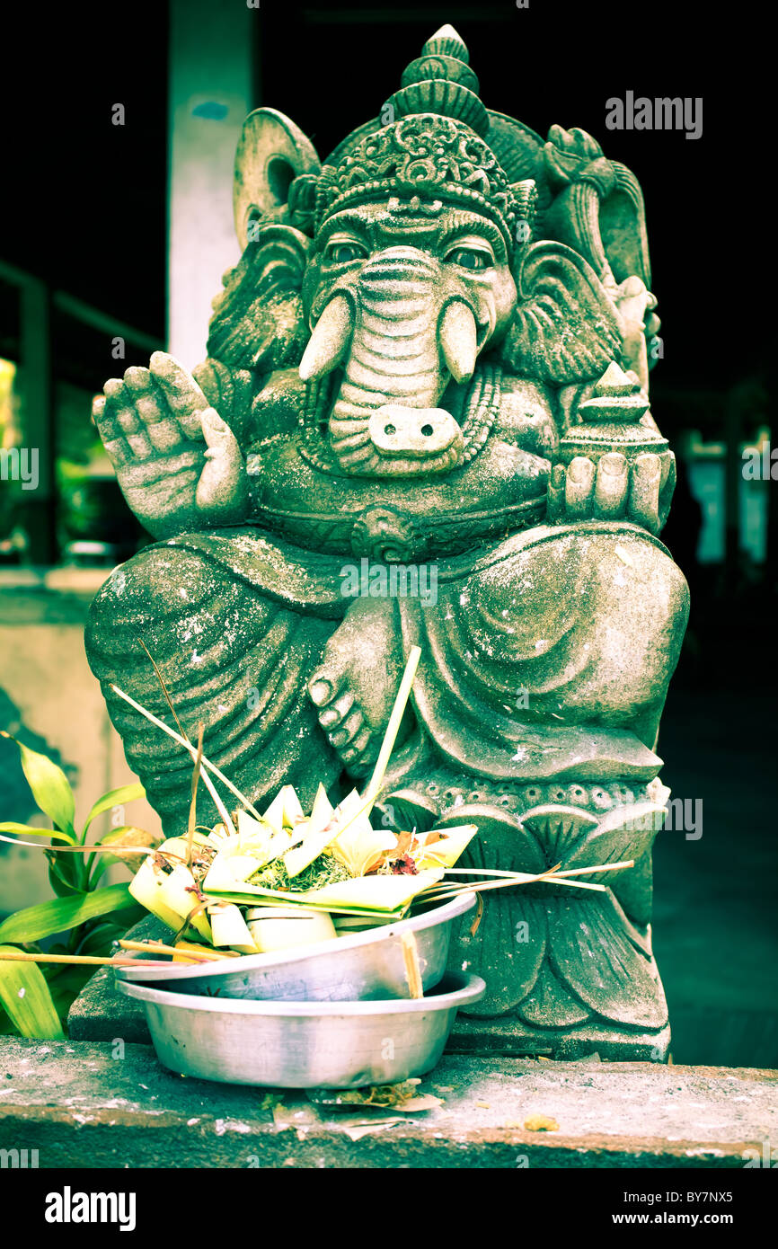A ganesh statue with offering below Stock Photo Alamy