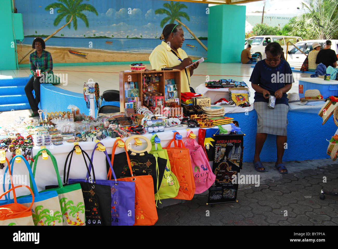 Street market stall selling clothes and souvenirs, St. John’s, Antigua, Leeward Islands, Caribbean. Stock Photo