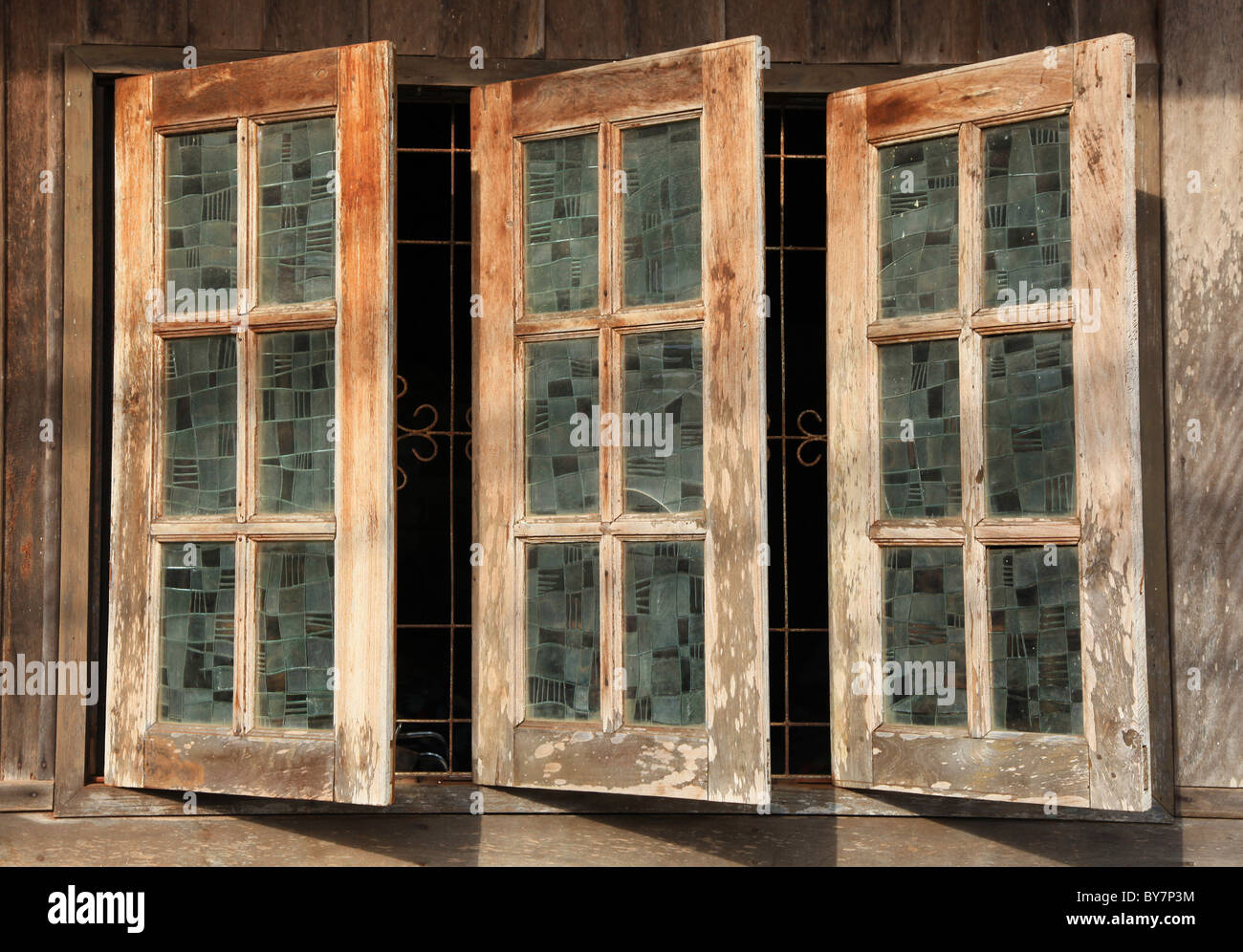 Wooden windows, Ko Lanta Island, Thailand Stock Photo