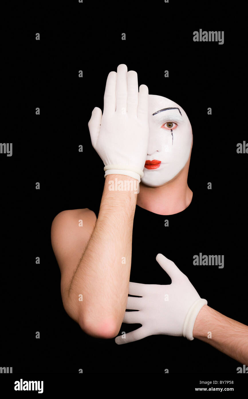 Portrait of artful peeping mime in white gloves Stock Photo Alamy