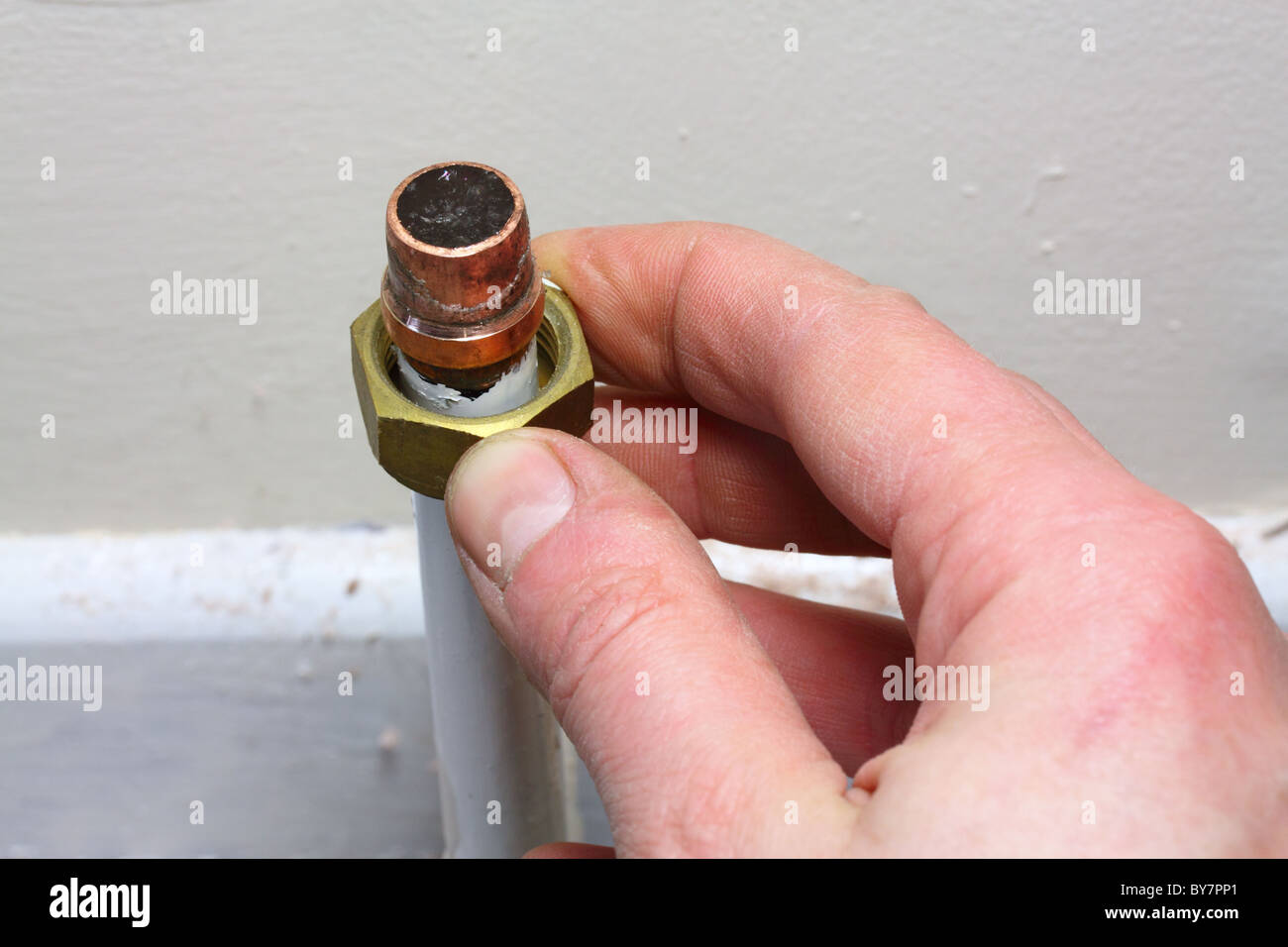 water frozen in household heating pipe during the cold weather of December 2010, UK Stock Photo