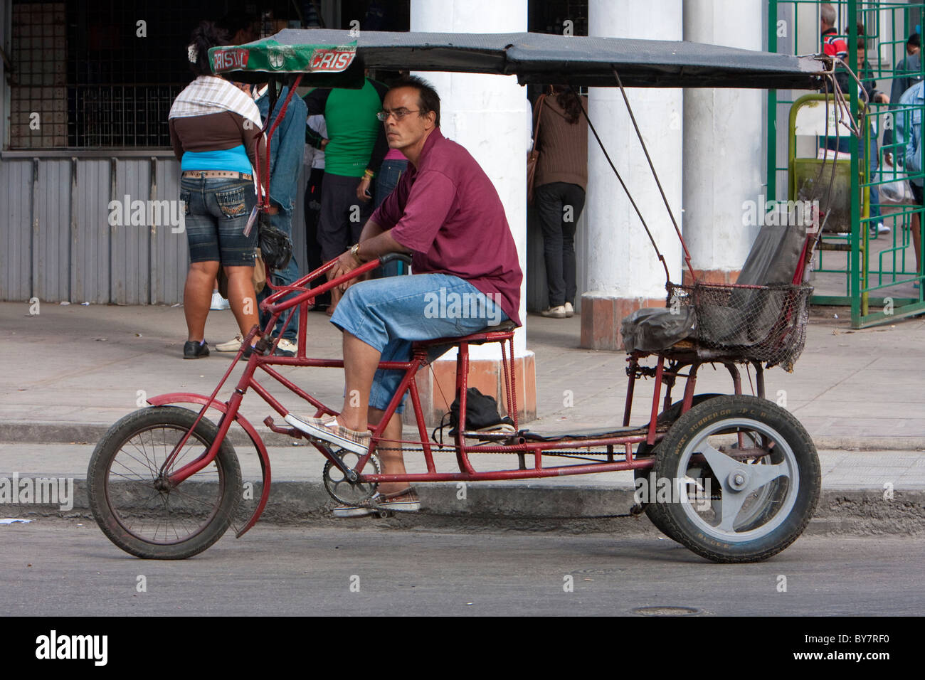 Cuba, Havana. Man-powered Bicycle-Taxis ('Bicitaxis') provide a cheap form of transportation in urban Havana. Stock Photo