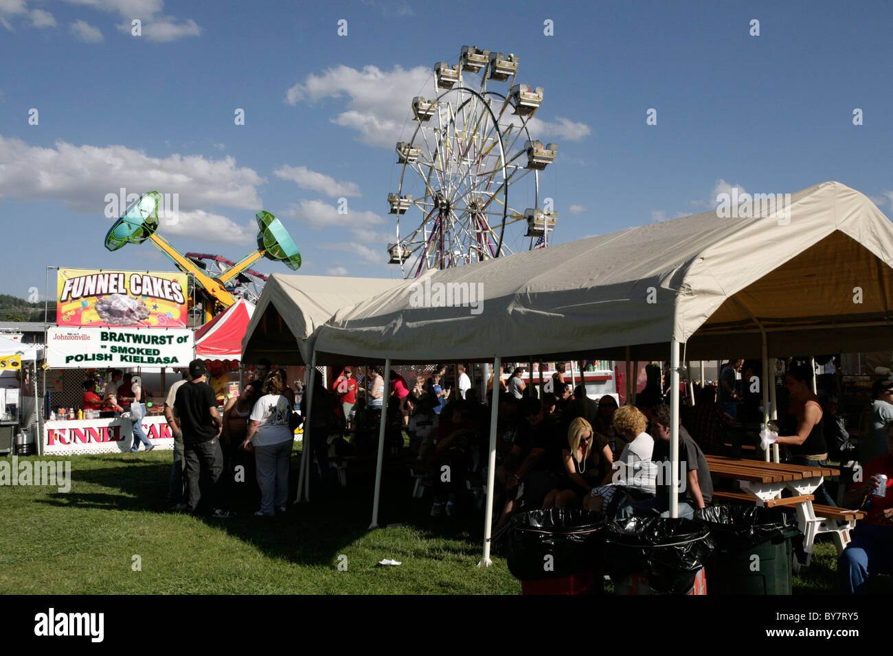 People and amusement rides at Paul Bunyan Days, St. Maries, Idaho, September 4, 2010 Stock Photo People and amusement rides at Paul Bunyan Days, St. Maries, Idaho, September 4, 2010 Stock Photo