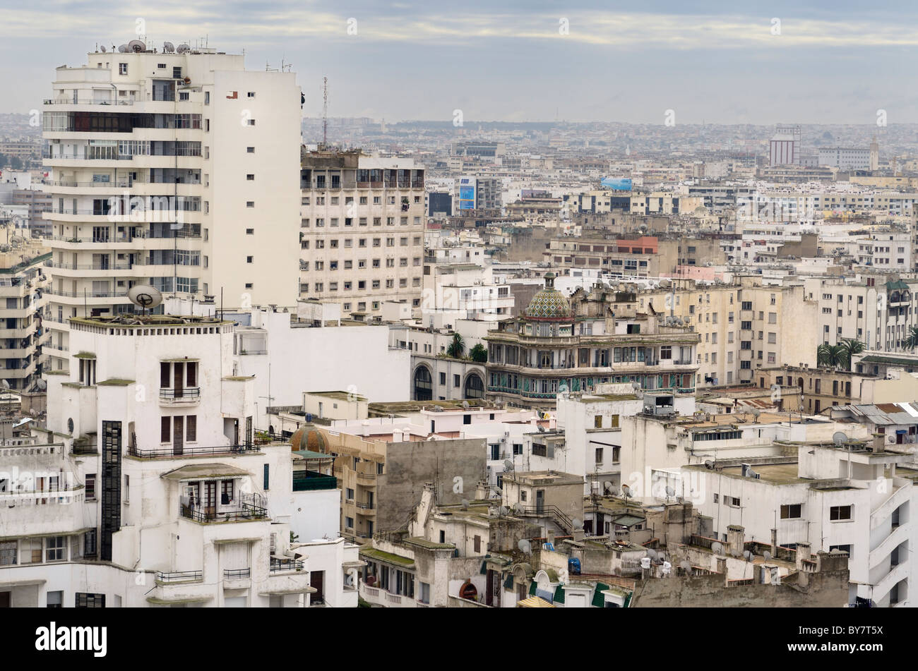 White hazy Casablanca cityscape skyline with high rise apaprtements with clouds Morocco Stock Photo